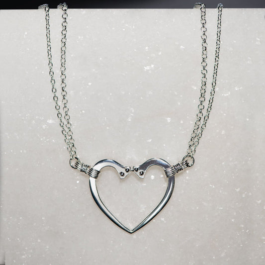 Ava - Equestrian Horseshoe Nail Heart Necklace in Silver